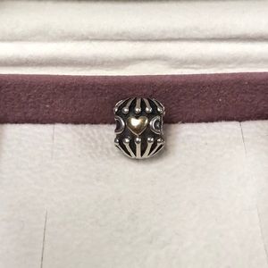 Authentic retired Pandora love and hugs bead